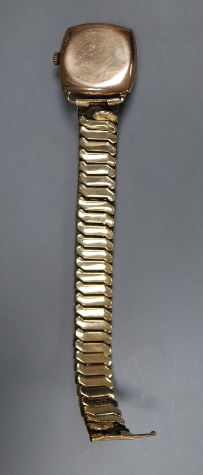 A gentlemans early 20th century 9ct gold manual wind wrist watch, retailed by Bravingtons, London,